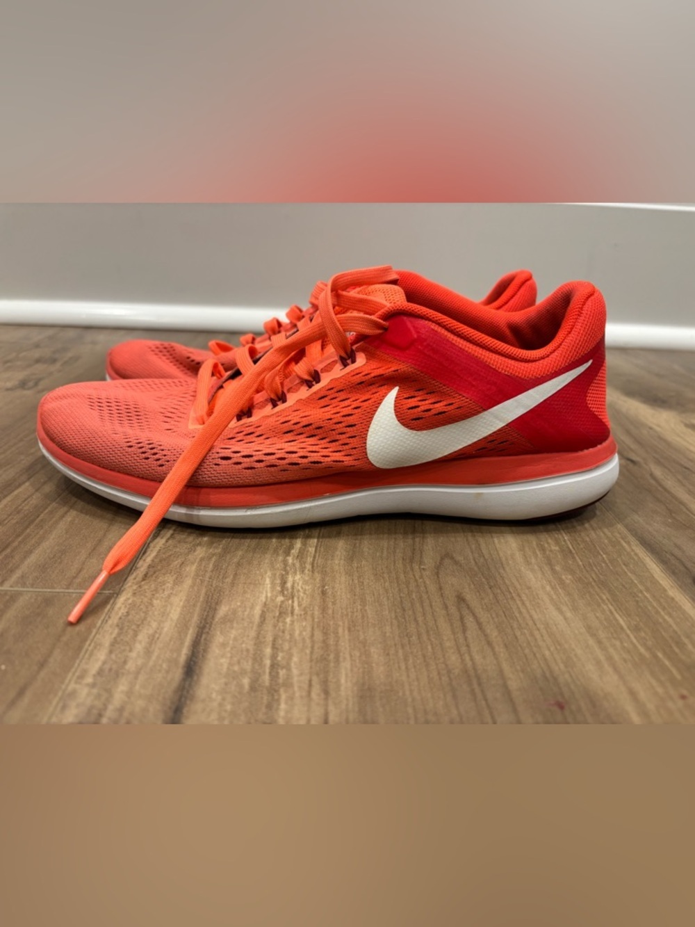 Nike Women's Orange Athletic Running Shoes with White Swoosh